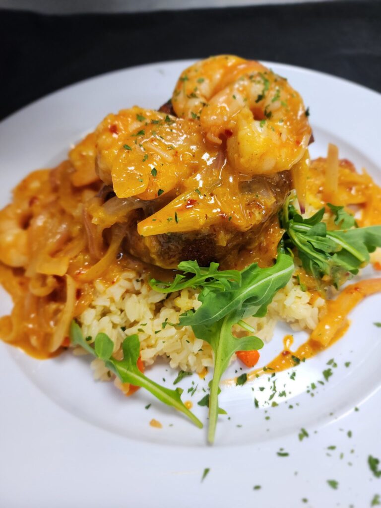 A plate of rice and shrimp from Johnnie’s By The Sea